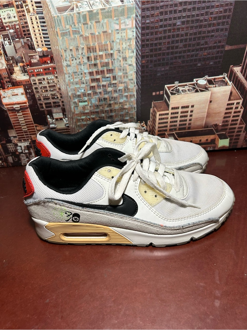 Nike White and Black Retro Cushion Sneakers with Gold Accent